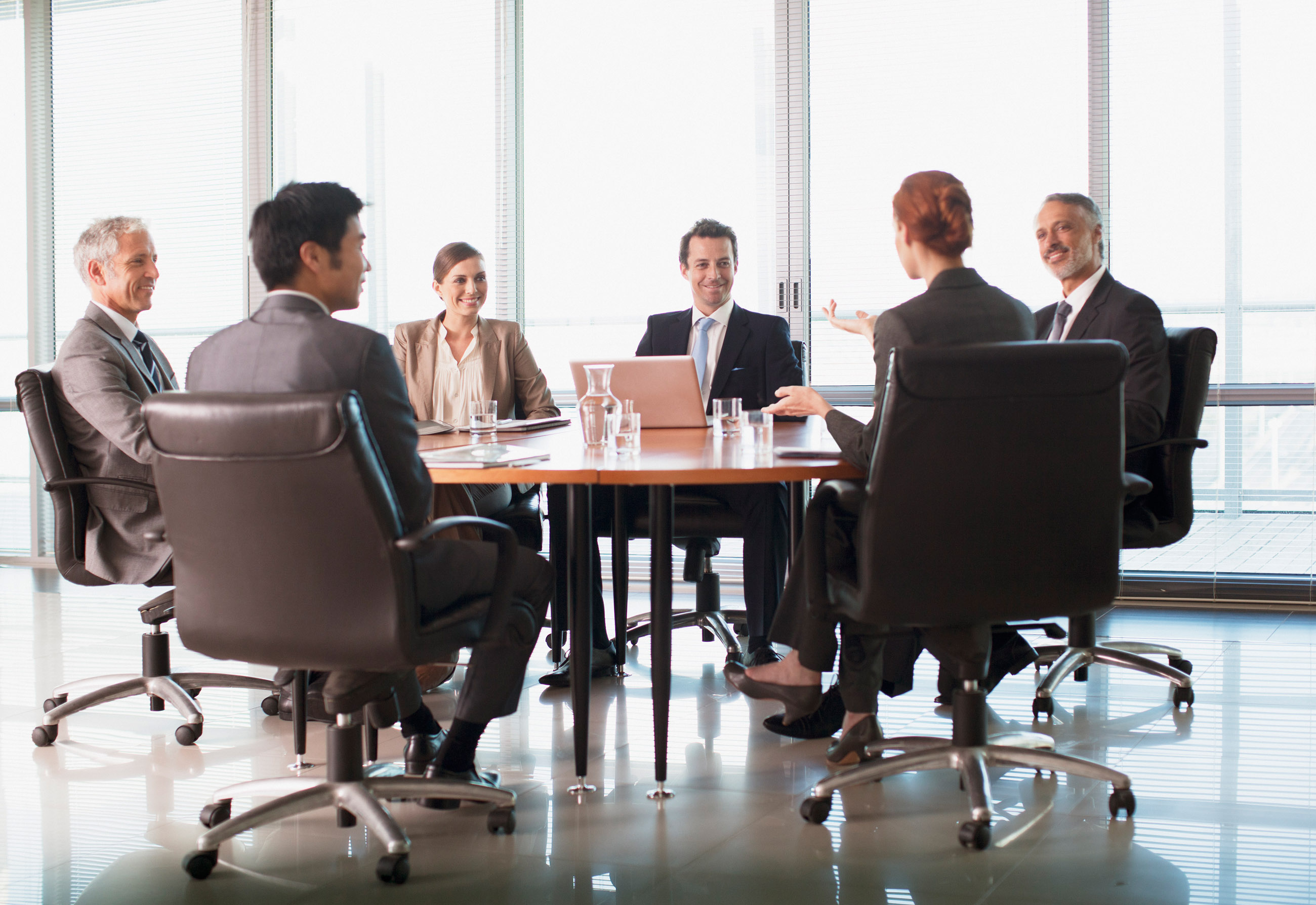 Business People Meeting At Table In Conference Room Singapore 